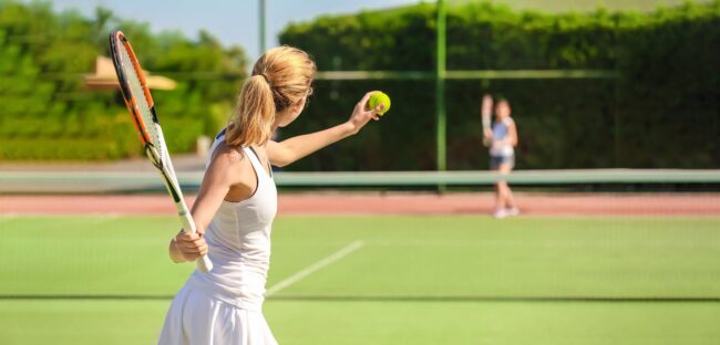 AdobeStock_170067471 Playing Tennis